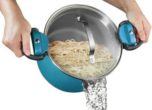 Aqua blue nonstick pasta pot with strainer lid, twist-lock handles, holding cooked noodles