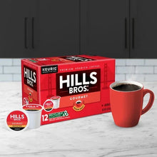 K-Cup pod box with Hills Bros. Gourmet medium roast and red mug