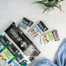 Assorted trail mix snack bags from a variety pack, with colored mix labels