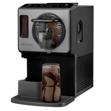 Automatic soft serve ice cream maker dispensing chocolate drink into a glass