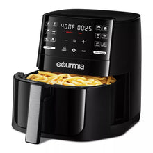 Black Gourmia 6-qt air fryer with fries in the cooking basket