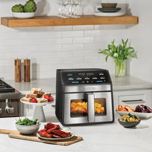 Digital air fryer on kitchen counter with drawers closed, black and silver