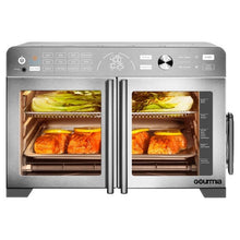 Stainless steel French door countertop oven with dual compartments, food cooking inside