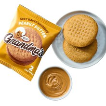 Peanut butter cookie set: yellow packet, two cookies, and peanut butter dip on plate