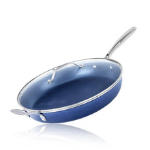 Blue nonstick frying pan with clear glass lid and stainless handle