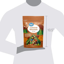 Caramel Mountain trail mix pouch shown on a shirt size scale