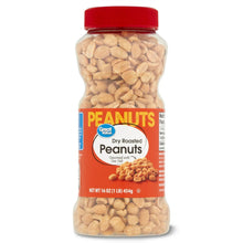 Dry roasted peanuts jar, red cap, glass filled with light beige peanuts