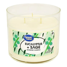 Great Value eucalyptus & sage scented candle, clear jar, green leaf label, unlit white wax
