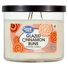 Glazed Cinnamon Buns scented candle in clear glass jar with black lid