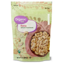 Organic raw whole cashews pouch, green bag with cashew bowl graphic