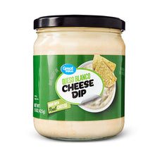Queso blanco cheese dip jar with black lid and beige dip, front label visible