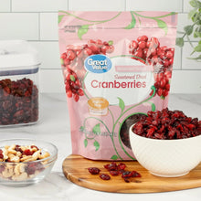 Dried cranberries snack bag with red cranberries and green leaves, reduced sugar