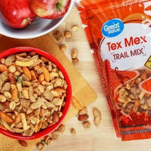 Tex Mex trail mix pouch beside red bowl of mixed seasoned nuts and seeds