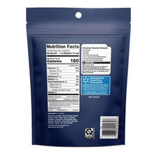 Whole almonds nutrition facts panel on back of blue bag