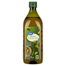 Extra virgin olive oil bottle with green cap and front label