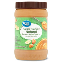 Creamy natural peanut butter spread jar with brown lid and green front label