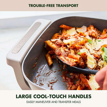 Electric skillet with cool-touch handles and browned food being served