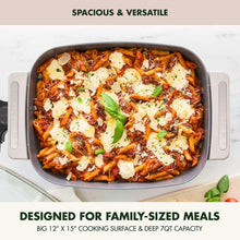Electric ceramic nonstick skillet filled with pasta and herbs