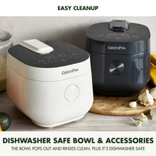 Two electric rice cookers side by side, cloud cream and dark graphite, with lids