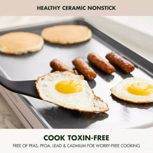 GreenPan electric griddle with warming drawer, close-up of sunny-side eggs and sausages