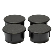 Set of four black plastic rack feet with flat tops and side pegs