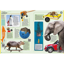 Open hardcover book spread with animal record photos and labels