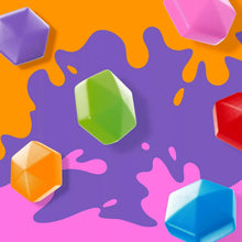 Colorful fruit splash graphic with green, purple, pink, and blue cube shapes
