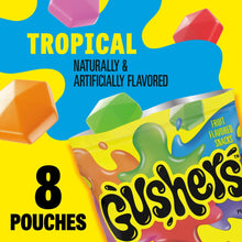 Gushers Tropical fruit-flavored snack box front showing 8 pouches and fruit icons.
