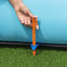 Inflatable water park anchoring stake tool in orange for pool edge security