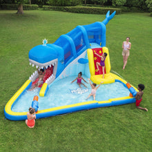 Kids inflatable water park with blue slide, yellow accents, and splash pool on grass