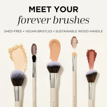 5-piece makeup brush set with assorted brush heads, cream handles, and silver ferrules
