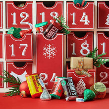 Holiday advent calendar with numbered boxes and wrapped chocolate pieces
