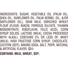 Candy bar ingredients panel listing sugar, oils, milk, wheat flour, and cocoa