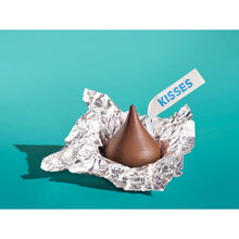 Milk chocolate KISSES cone candy wrapped in silver foil
