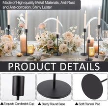 Black metal taper candle holder set with smooth round base and tall center stem