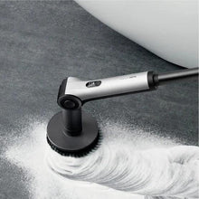 HOTO Flexi cordless spin scrubber with round brush head actively scrubbing a basin surface