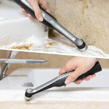 Cordless spin scrubber scrubbing sink with flat cleaning head held by hand