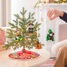 Mickey and friends blown glass ornaments hanging from metal hooks