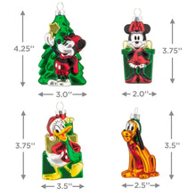 Four blown glass Disney ornaments: Mickey tree, Minnie gift, Donald, Pluto