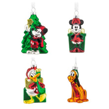 Green Mickey Mouse blown glass ornament shaped like a Christmas tree with red bow