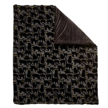 Black faux fur throw blanket with embroidered cat pattern, stitched border trim