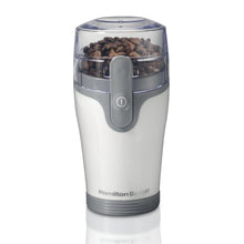 Electric coffee grinder with clear lid and white body, gray front switch