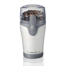 White electric coffee grinder with clear hopper and gray on/off button