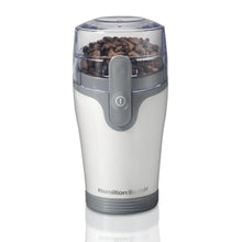 White electric coffee grinder with clear bean hopper and gray power switch