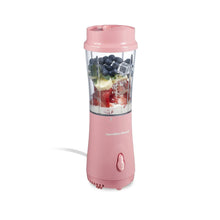 Coral personal blender with travel lid and clear blending jar, side power button