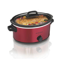 Red slow cooker with black lid open, showing stew and vegetables inside.