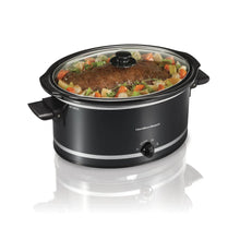 Black slow cooker with glass lid and black side handles, stoneware crock.