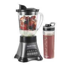 Black countertop blender with clear 40 oz jar and matching blend-in travel cup