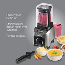 Quiet blender with clear 32 oz jar, stainless base, tamper tool, and accessories.