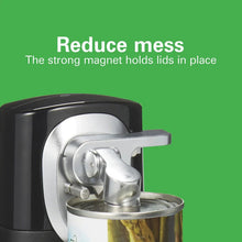 Black can opener with chrome cutter pressing down on a can lid